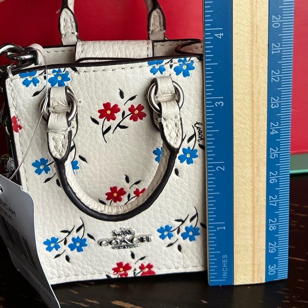 Coach Floral Key Holder in White with Red and Blue Accents - Picture 2 of 13